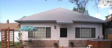 Front View of Carriage House Cottage and Private Patio/Hot Tub