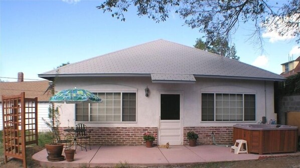 Front View of Carriage House Cottage and Private Patio/Hot Tub