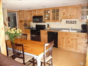 Open Kitchen with seating for six.