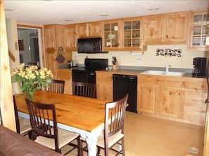 Open Kitchen with seating for six.