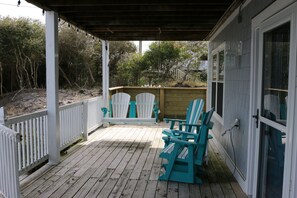 Enjoy time out of the sun on the lower level deck and relax on the porch swing.