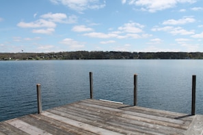 Large dock sitting area with bench, chairs. Great fishing right off the dock