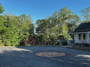 Parking area in front will hold three cars