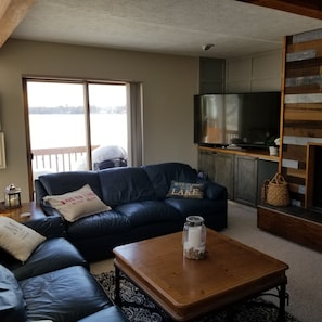 Living room with access to upper deck