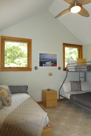 Bedroom with twin over full bunk bed and daybed/twin