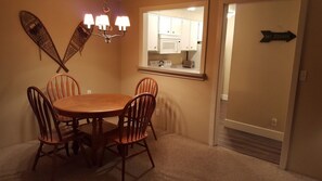 Quaint dining area. Table leaf in the bedroom closet