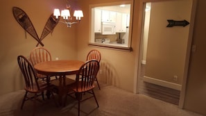 Quaint dining area. Table leaf in the bedroom closet