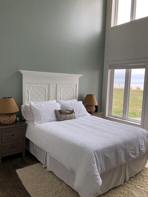 Master bedroom with soaring ocean views.