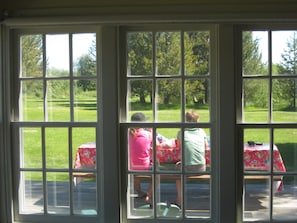 looking out on deck and backyard from dining room