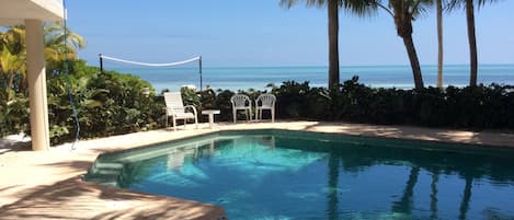 Beautiful view from pool to volley ball to private beachfront