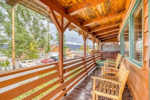 Relax on the front deck and take in beautiful Lake, Marina and Mountain views.