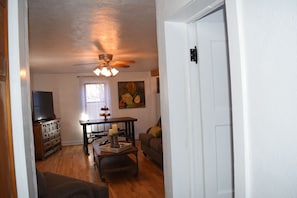 Another view of the living area. Brand new TV and kitchen table. 