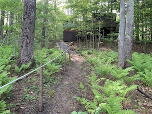 The path sloping down to the lake features new steps and a handrail.