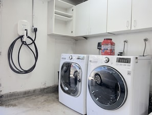 Washer/Dryer  and Level2 EV Charger available in the  attached garage.