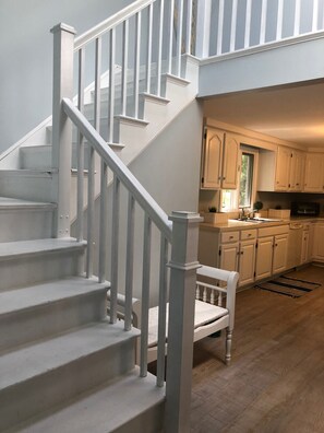 Staircase to private master bedroom and en-suite bathroom 