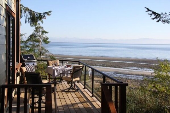 Deck with beach in background.