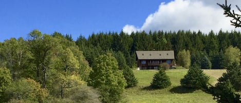 The house seen from the site of the original farm homestead.