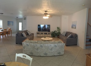 Newly furnished living area with 65" 4K Smart TV and comfortable couches!!!
