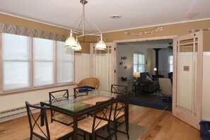 Dining Room Area Sits 8 People.  Small step down to enter the living room