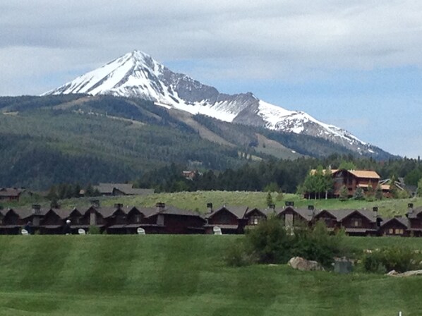 View from Big Sky golf course towards Lone Peak with SPC Condos in the forground