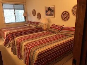 Second bedroom; each bedroom has a television