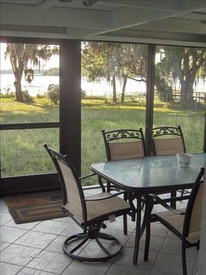 PORCH     Screened-In, with table and 8 chairs plus gas grill and 2 ceiling fans