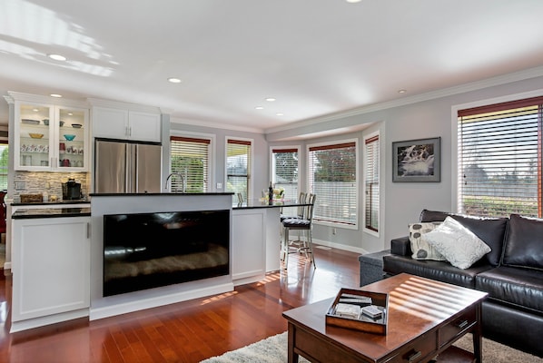 Our open concept connects the kitchen to one of our two living rooms. 