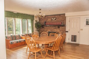 Spacious breakfast nook adjacent to kitchen and large dining area