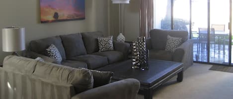 Comfortable, large, open living room includes 50' flat screen