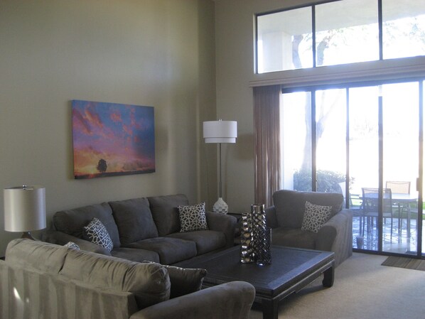 Comfortable, large, open living room includes 50' flat screen