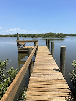 New dock with seating and fish cleaning station. 