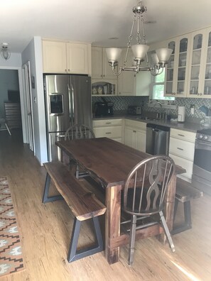 Updated kitchen with stainless appliances.