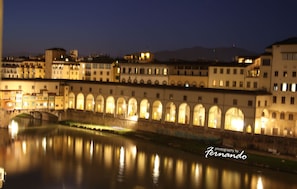 PONTE VECCHIO BY NIGHT- PHOTO TAKEN FROM ONE OF THE 3 LARGE WINDOWS OF THE APT
