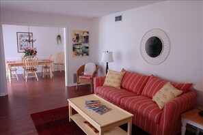 View of Living Room and Dining Room; a den and sunroom offer more seating.