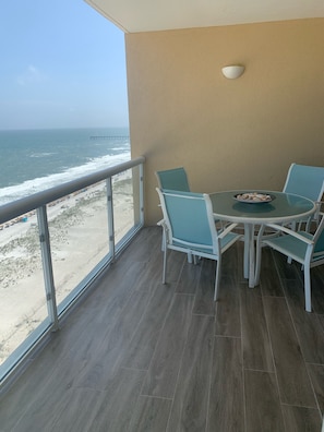 Welcoming balcony with seating to take in the beautiful Gulf views 