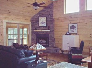 Rock fireplace in living room.