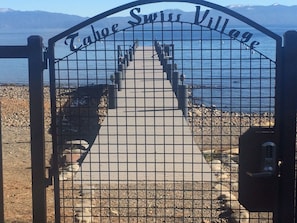 Beach Gate to private HOA beach.  Rocky, but typical of west shore.