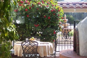 Enjoy your breakfast or any meal in the courtyard