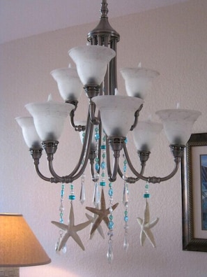 Custom made, beaded chandelier in dining area.