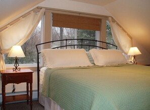 Master bedroom with king bed on the second floor, rear of the house