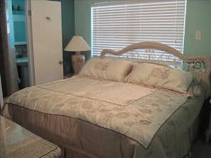 Master bedroom with king bed. There is also tv in this bedroom.