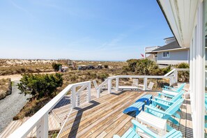 Plenty of outdoor seating with views of the dunes and ocean