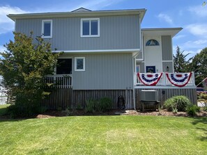 Large yard for playing corn hole.