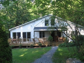 View of the front of the house from our private road. We have a spacious deck.