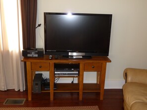 Large Screen TV in Living Room with Blue-Ray DVD Player and HD Cable