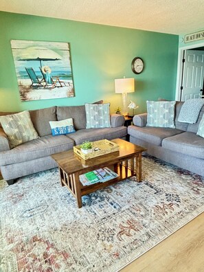 Living area with queen sofa & loveseat