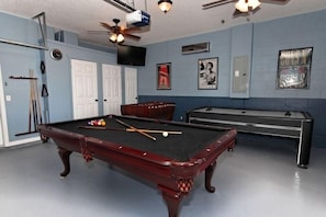 World class game room, separate heat and air condition. Pool table, air hockey and foosball