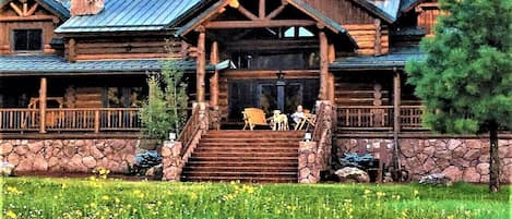 View of the back of the cabin looking towards the lake.
