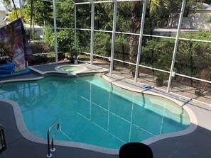 Heated pool with waterfall spa