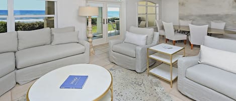 Relax in style as you view waves of the Gulf from your living, dining  & kitchen